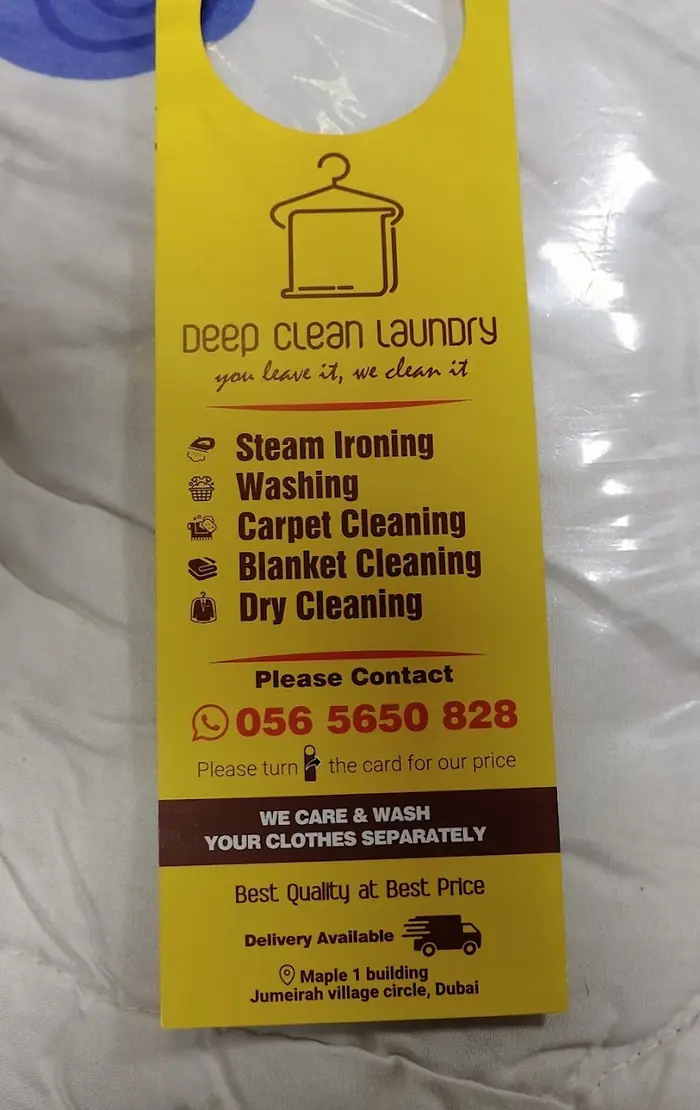 Deep Clean Laundry door hanger listing steam ironing, washing, carpet, blanket and dry cleaning