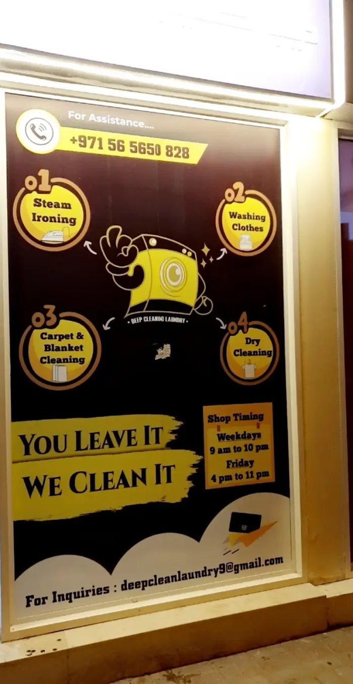 Shop window poster with the four services and the shop phone number